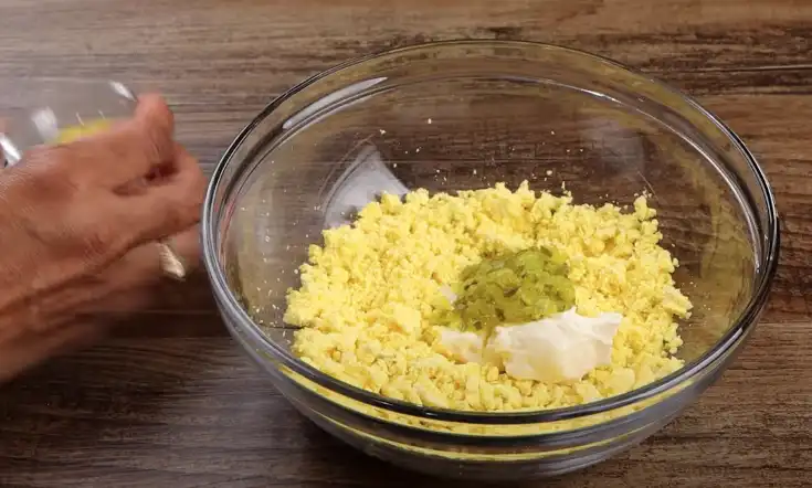 making the filling for deviled eggs